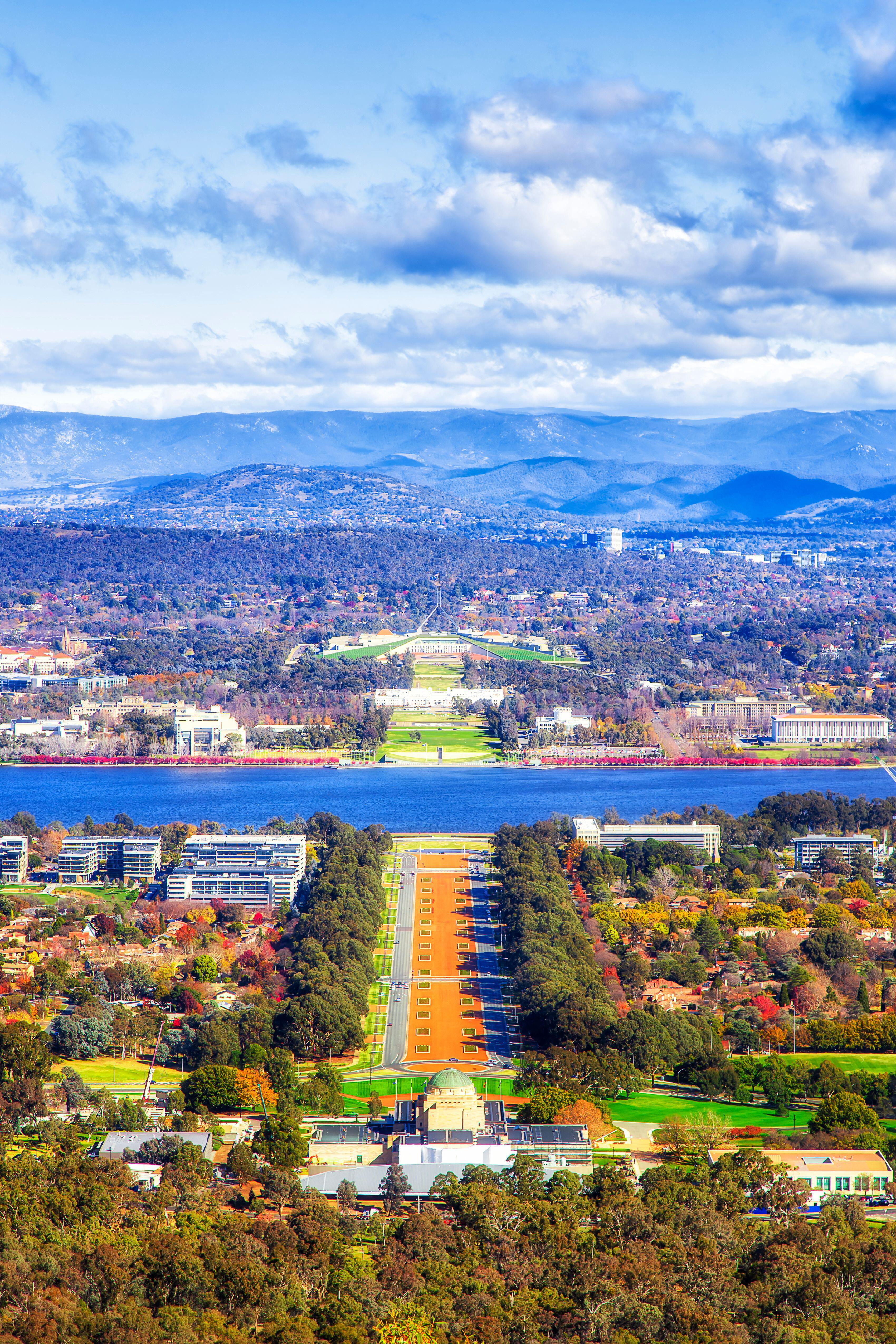 Canberra from Mount Ainslie, showing the Australian War Memorial (B), Lake Burley Griffin (C), Australian Parliament House (T) and the High Court of Australia (CL).