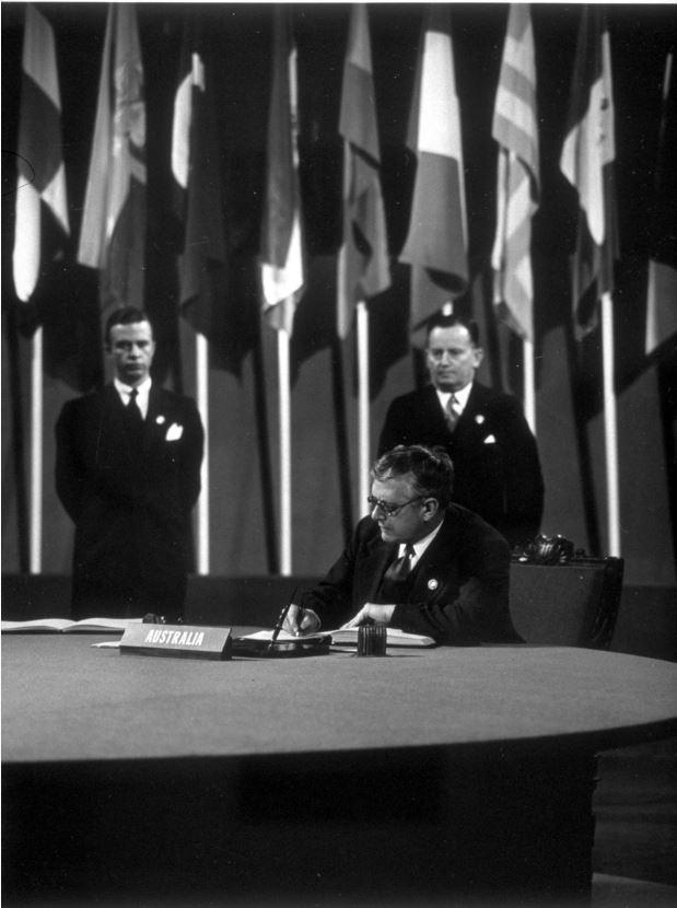 Dr Herbert Vere Evatt (Attorney-General and Minister for External Affairs), member of the delegation from Australia, signing the Charter of the United Nations in San Francisco on 26 June 1945.